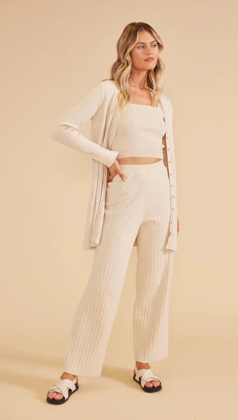 Available now at Outline Clothing - The Paige Knit Pants are an easy-to-wear everyday staple. Crafted from a stretch rib knit fabrication for ultimate comfort. Wear with the matching Paige Knit Cardigan
