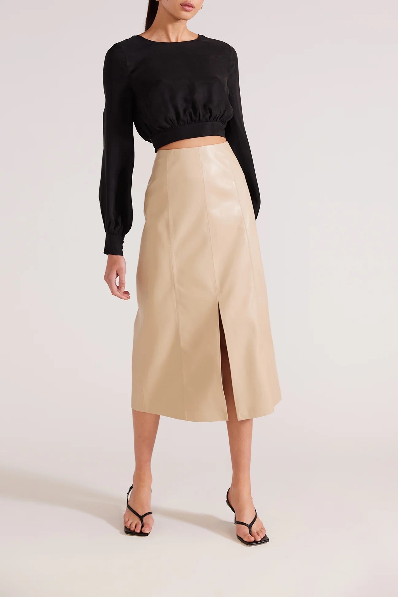 Outline Clothing is delighted to bring you this premium faux leather skirt which exudes classic sophistication and elegance.